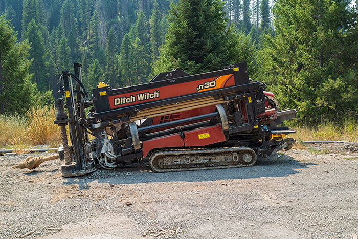 A Ditch Witch product on a road.