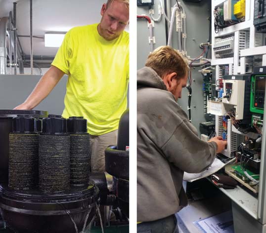 Two irrigators working on installing irrigation pumps